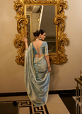 Party wear Sky Blue Tissue shimmer saree with zari weaving and sequin lace.