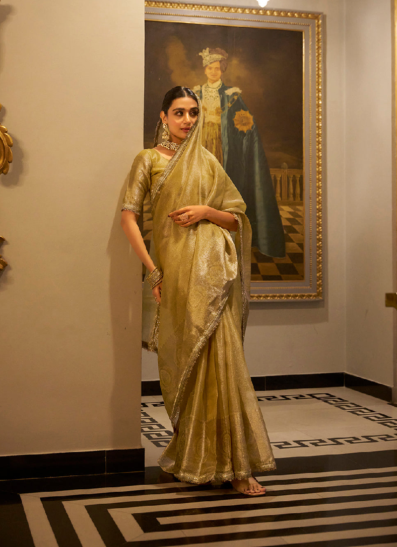 Gorgeous Gold Tissue shimmer saree with zari weaving and sequin lace