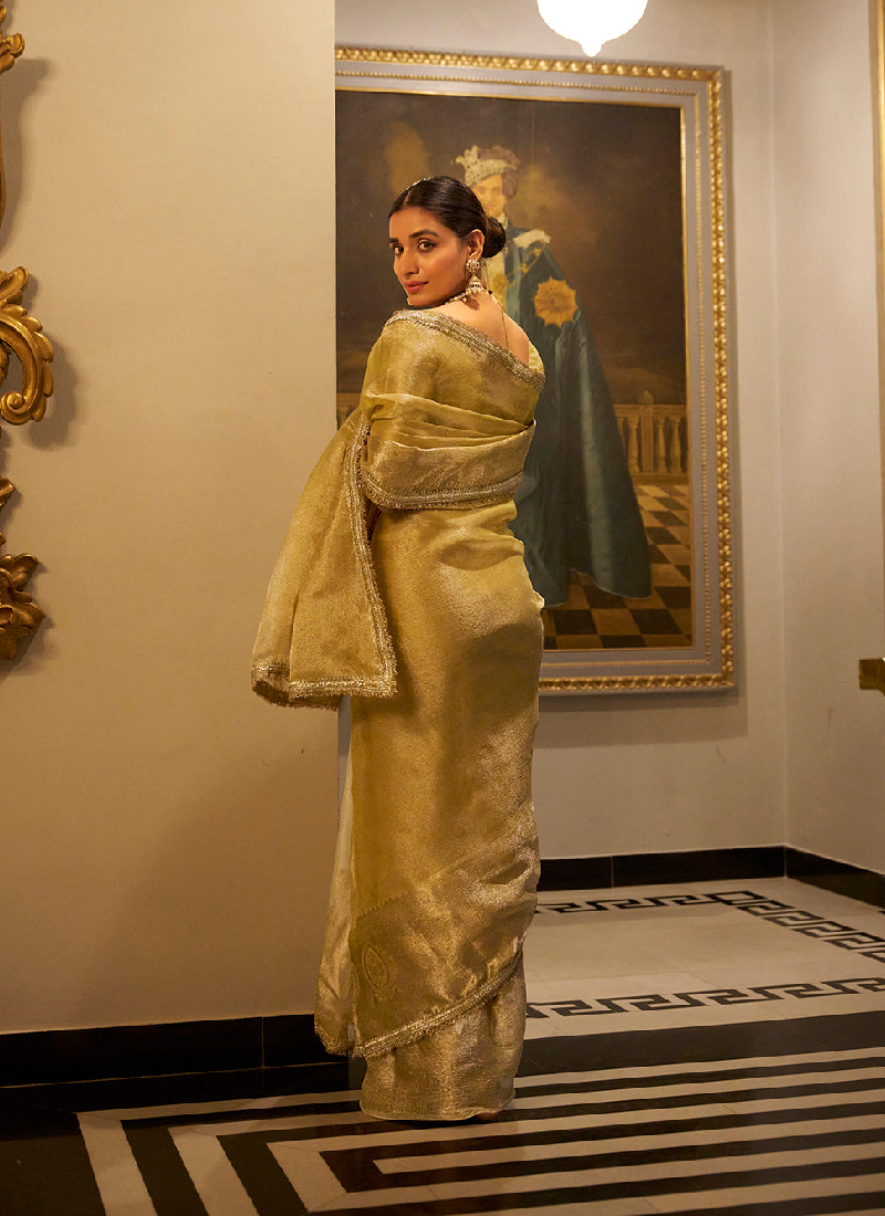 Gorgeous Gold Tissue shimmer saree with zari weaving and sequin lace