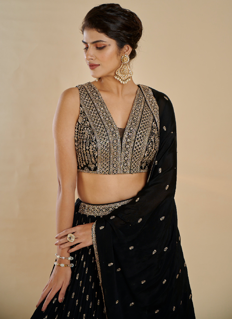 Alluring Black georgette Lehenga with sequin thread embroidery comes with a  designer blouse.