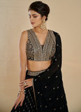 Alluring Black georgette Lehenga with sequin thread embroidery comes with a  designer blouse.