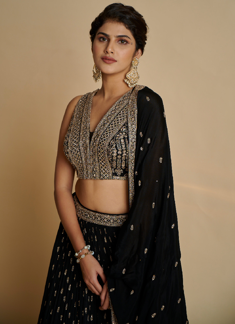 Alluring Black georgette Lehenga with sequin thread embroidery comes with a  designer blouse.