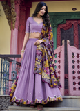 Alluring Lavender SIlk lehenga choli with sequin embrodiery and kalamkari print border.