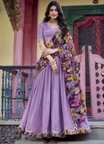 Alluring Lavender SIlk lehenga choli with sequin embrodiery and kalamkari print border.