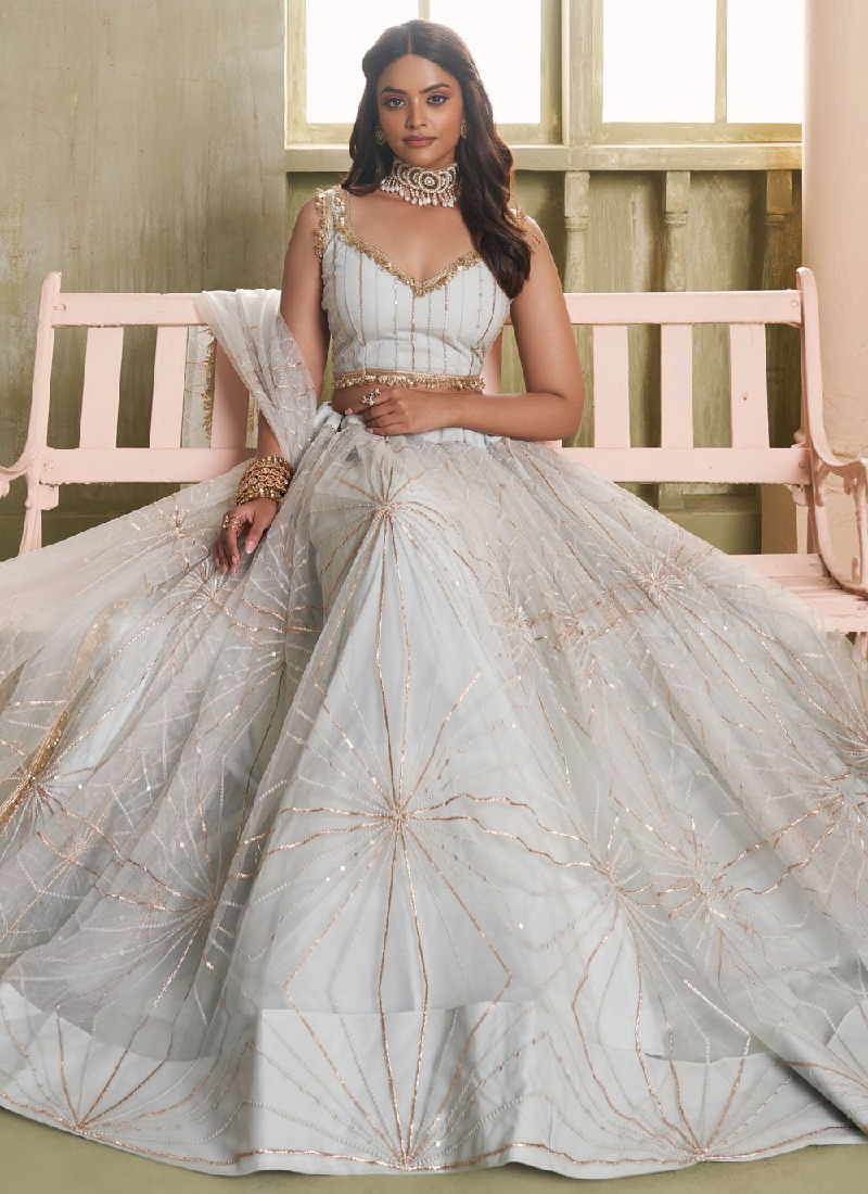 Amazing white soft net lehenga choli with sequin and zari embroidery work