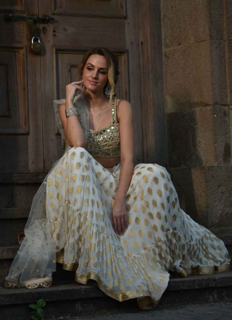 Attractive White Georgette Zari Weaving Ruffle Lehenga Choli
