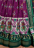 Attractive Patola Printed Silk Green And Purple Chaniya Choli