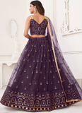 Butterfly Net Zari Embroidery Work Wine Lehenga Choli For Wedding