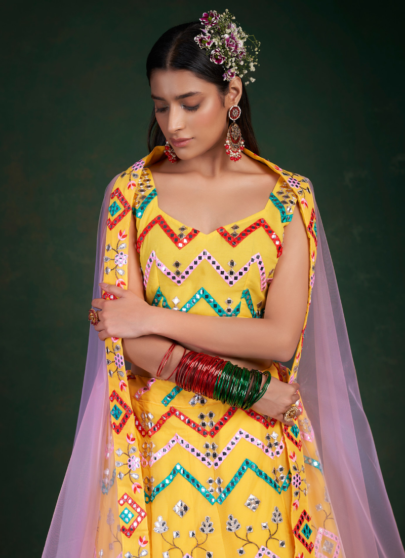 Captivating Multi Foil Mirror Yellow Georgette Lehenga Choli