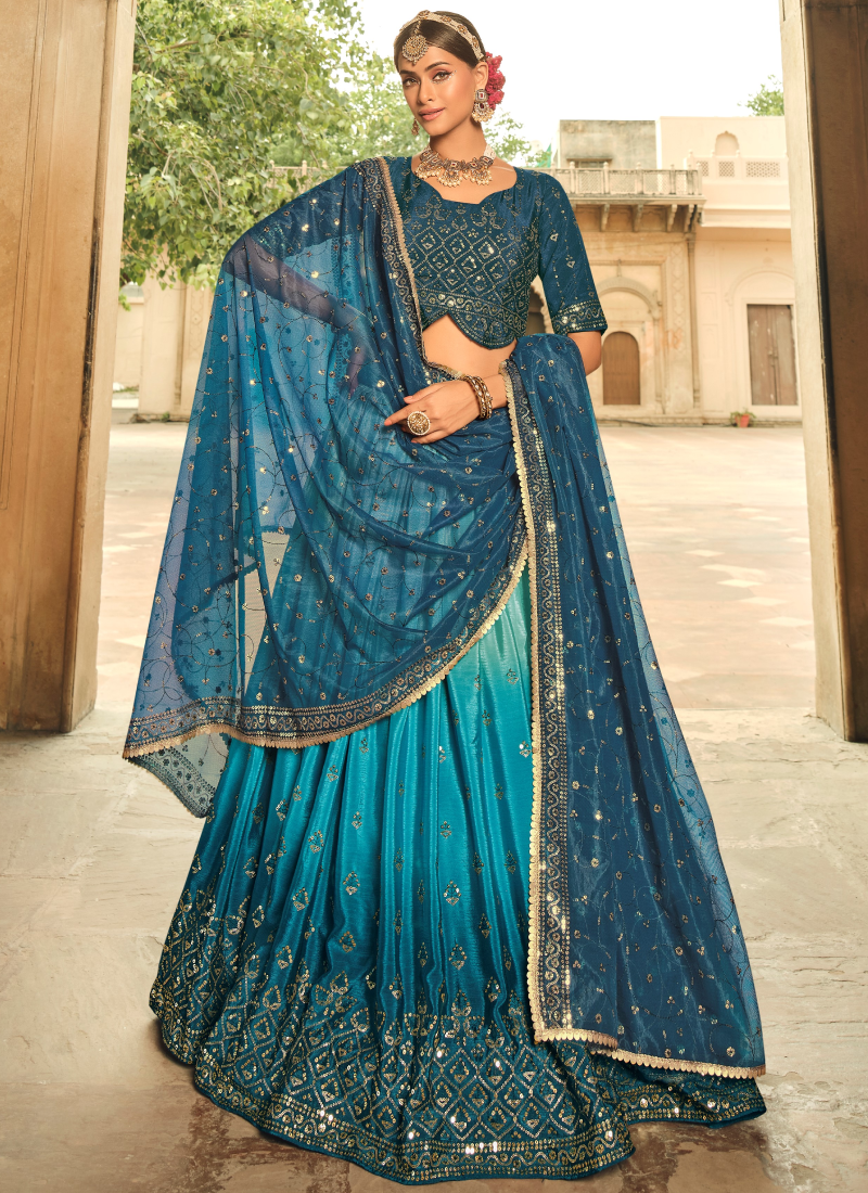 Fancy Choli With Shaded Teal Blue Embroidered Lehenga Choli
