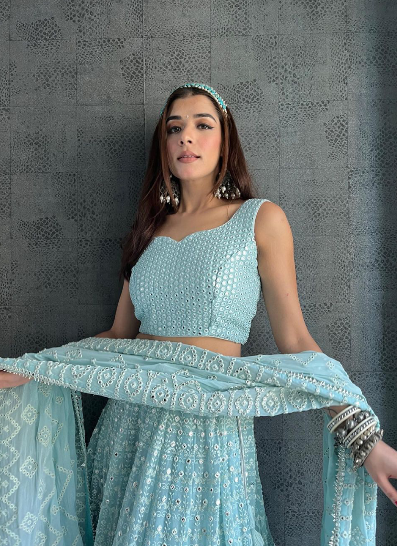 Impressive Sky Blue Foil Mirror Work Georgette Lehenga Choli