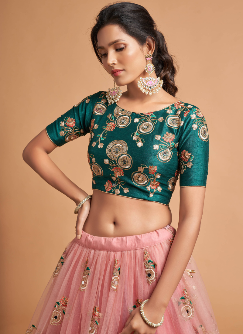 Real Mirror With Embroidered Work Soft Net Peach Lehenga Choli