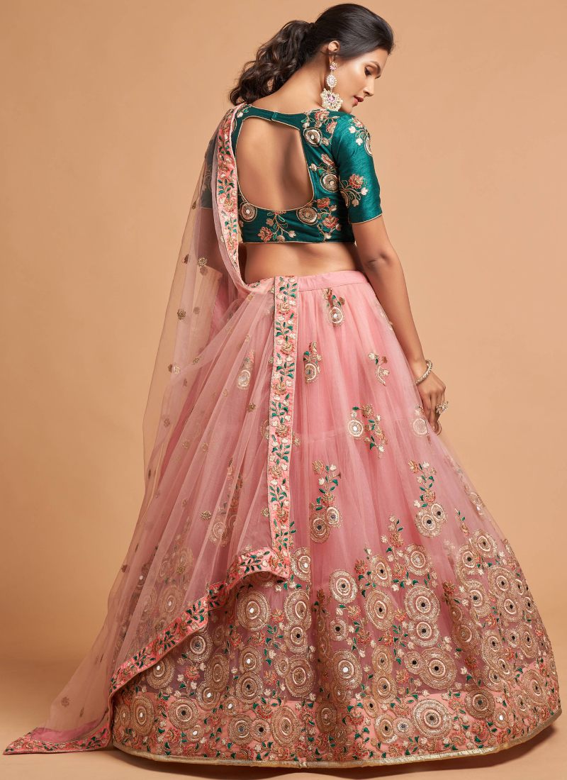 Real Mirror With Embroidered Work Soft Net Peach Lehenga Choli