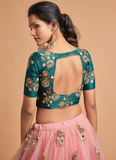 Real Mirror With Embroidered Work Soft Net Peach Lehenga Choli