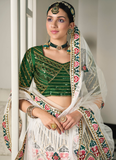 Green Choli With White Sequence Embroidered Silk Lehenga