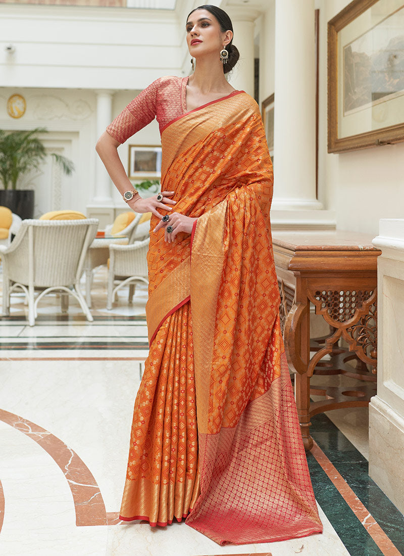Beautiful Orange Color Silk Bandhani Patola Print Saree Design